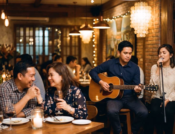 A Filipino acoustic duo provides live music for a romantic anniversary dinner.