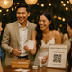 Young Filipino couple guiding guests at a lively photobooth with game cards and a prize basket