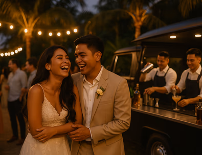 Young Filipino couple at a wedding mobile bar with bartenders mixing cocktails under warm lights